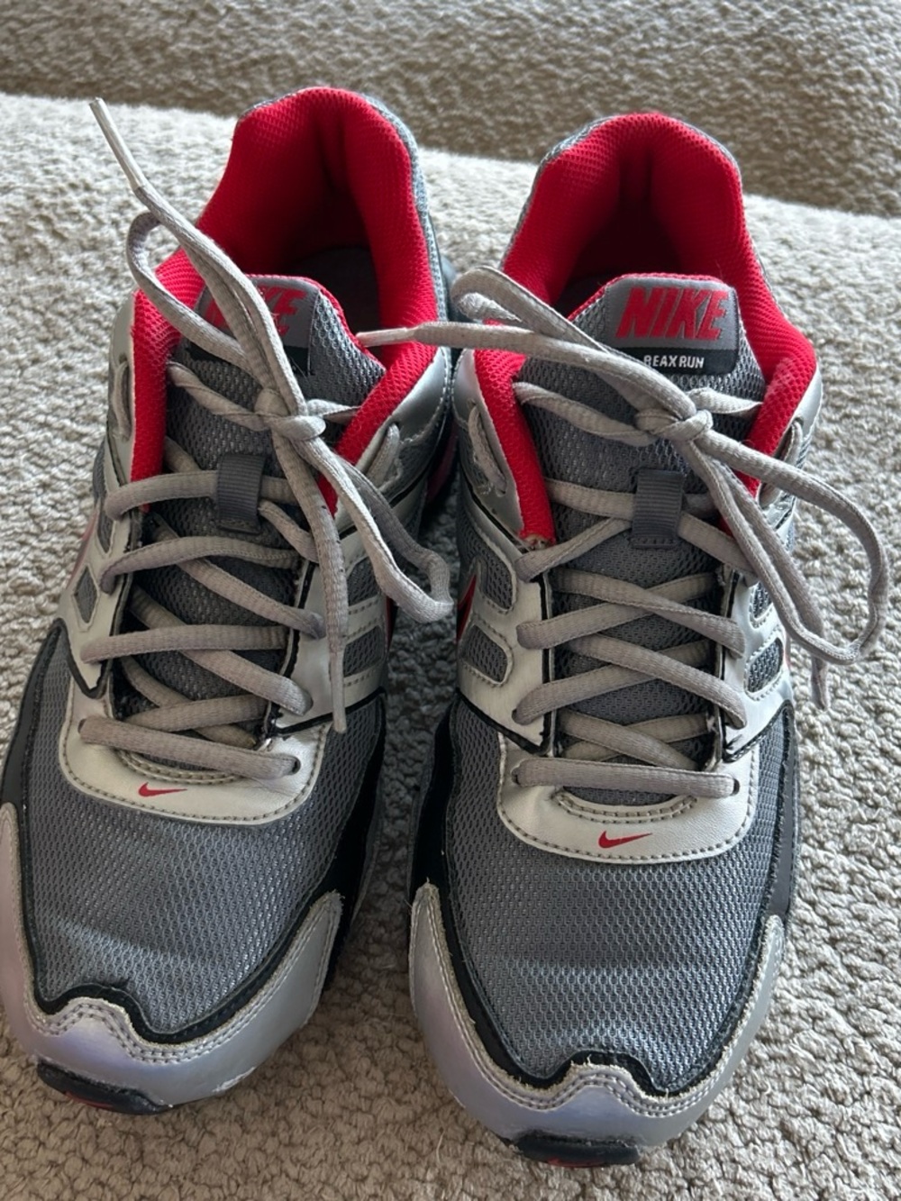 Nike Kids Gray Sneakers with Red Accents